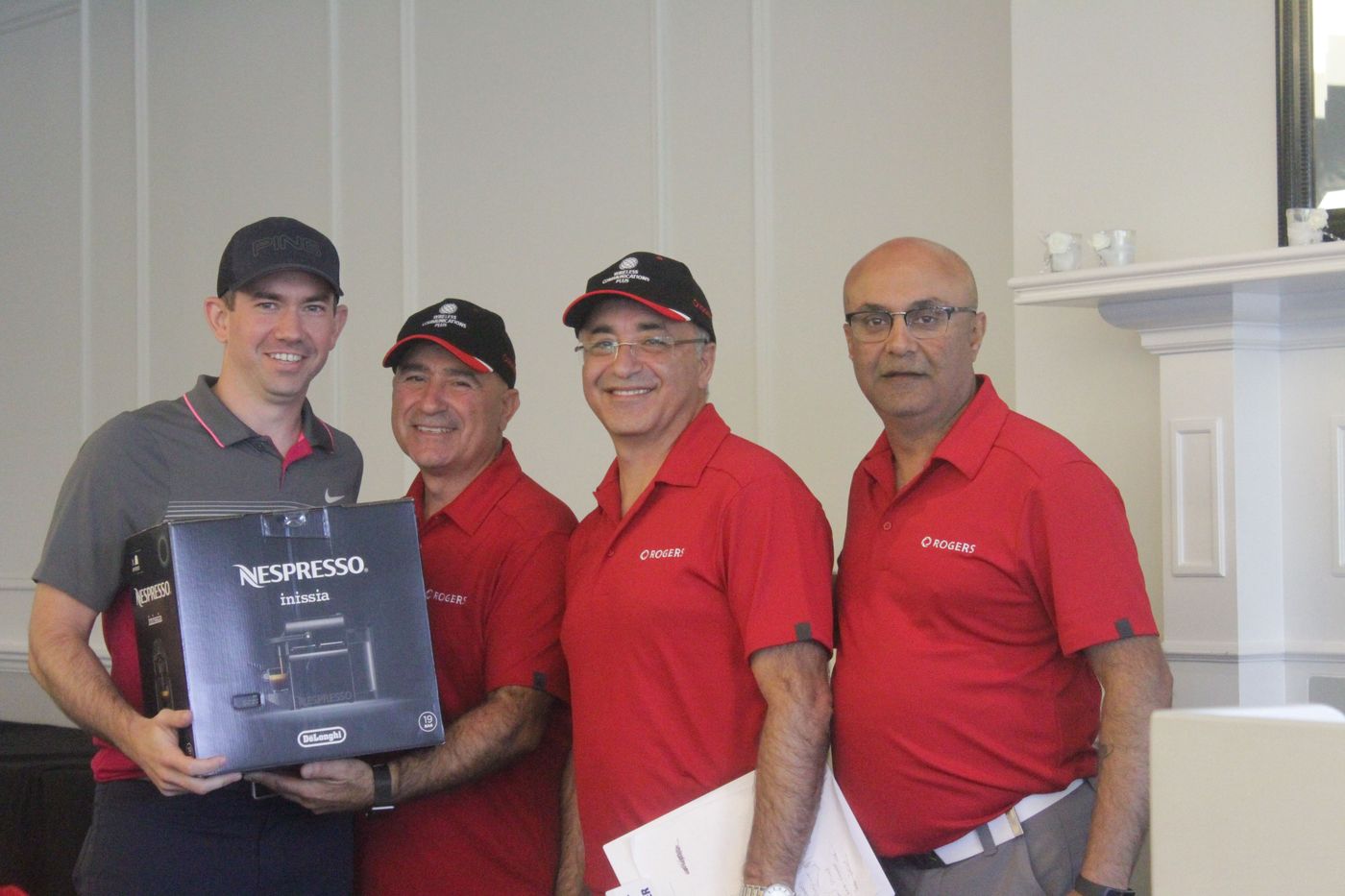 WCP team members receiving an award at the annual golf tournament